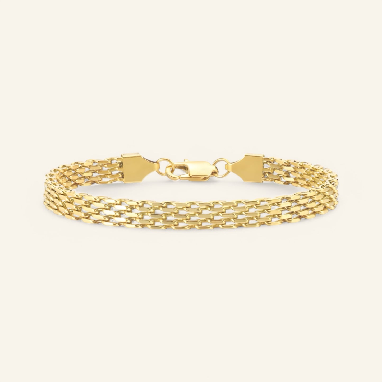 Detalj av armband elysian link med flätad kedjedesign i guldpläterat stål
