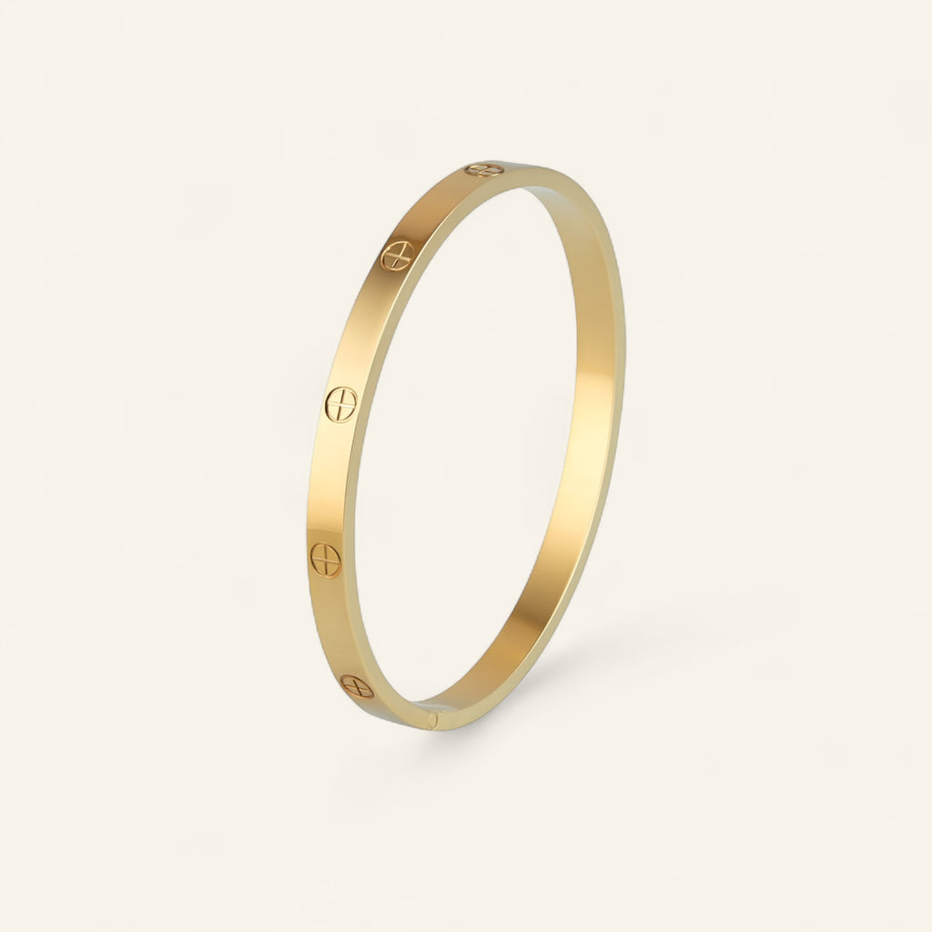 Armring med skruvdetaljer