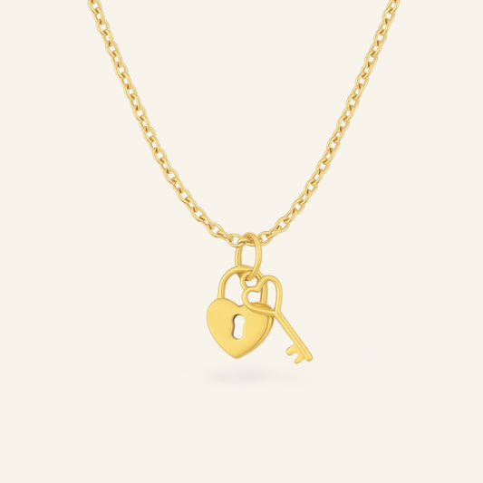 Halsband med hjärtformat hänglås och nyckel
