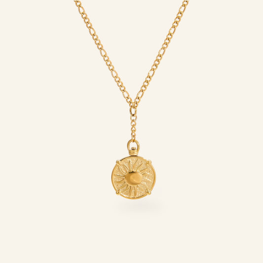 Halsband med solsymbol