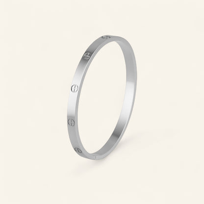 Armring med skruvdetaljer