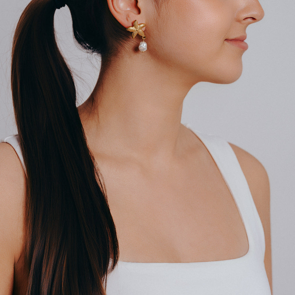 Örhänge sjöstjarna med pärla