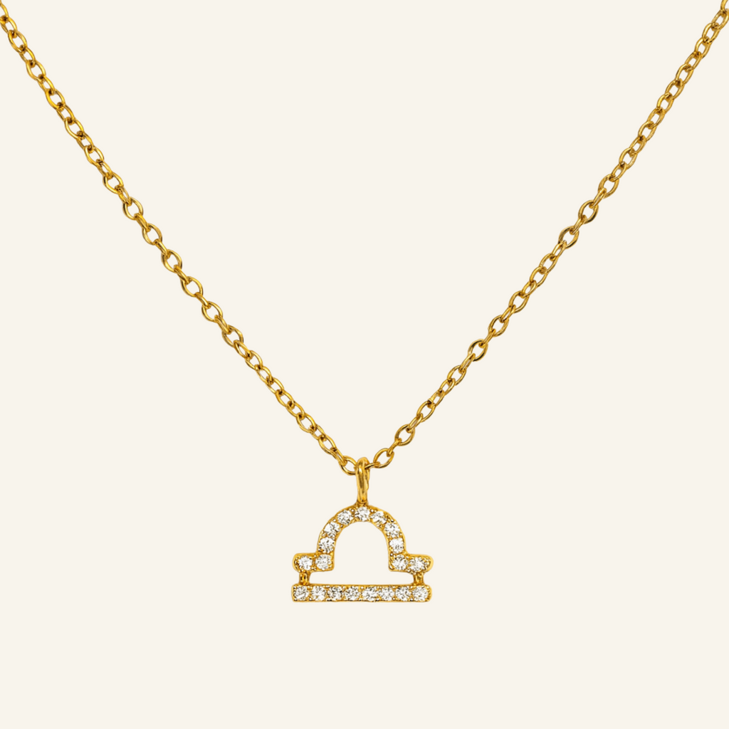 Halsband med zodiak-hänge med kristaller