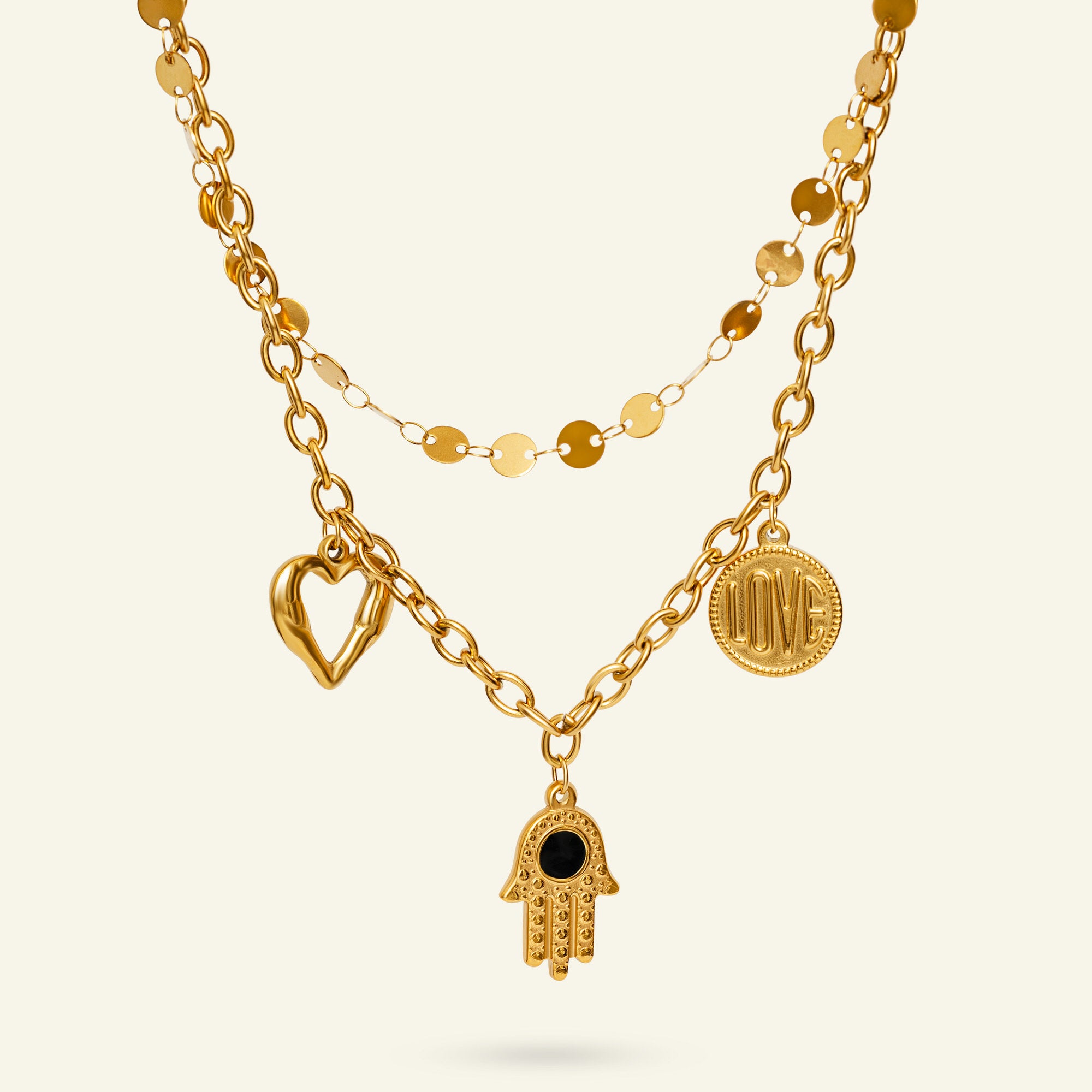 vattentåligt halsband med hamsa och berlocker