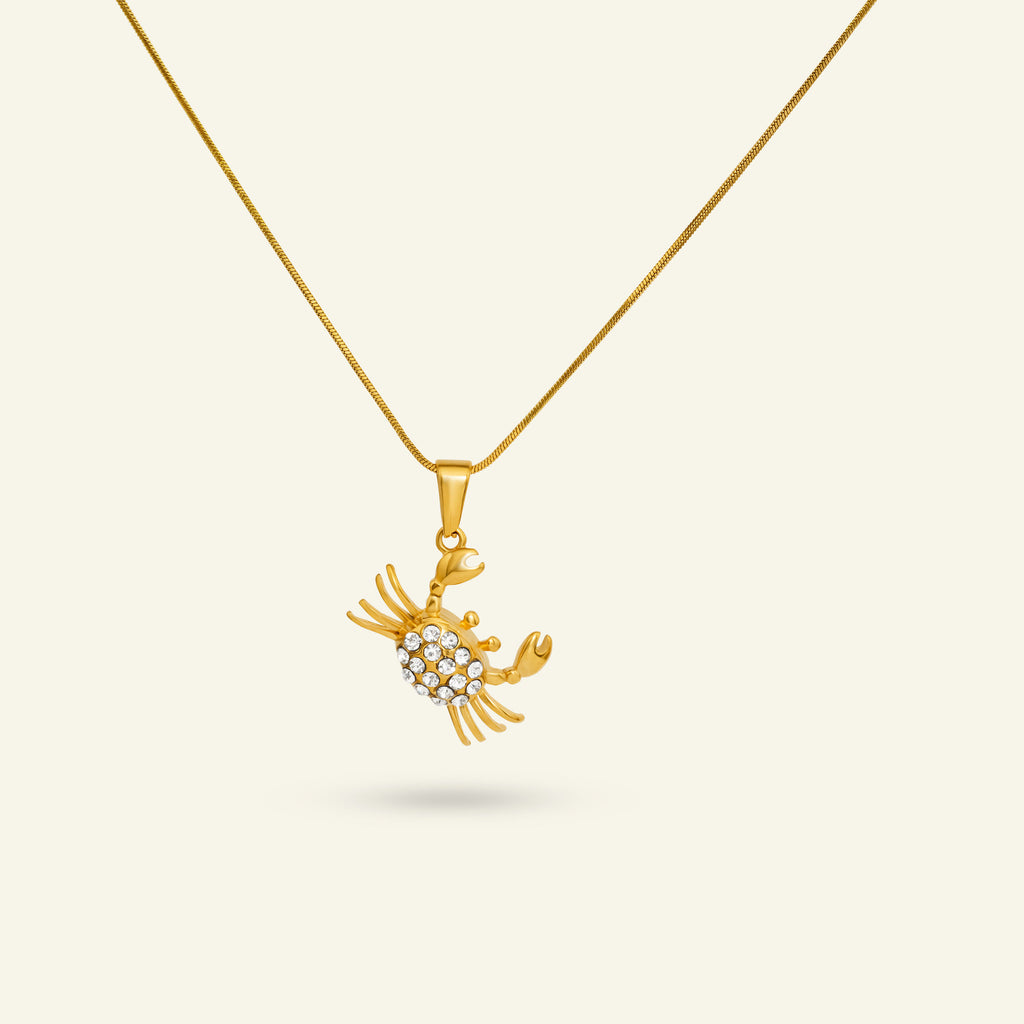 vattentåligt smycke hänge krabba guld