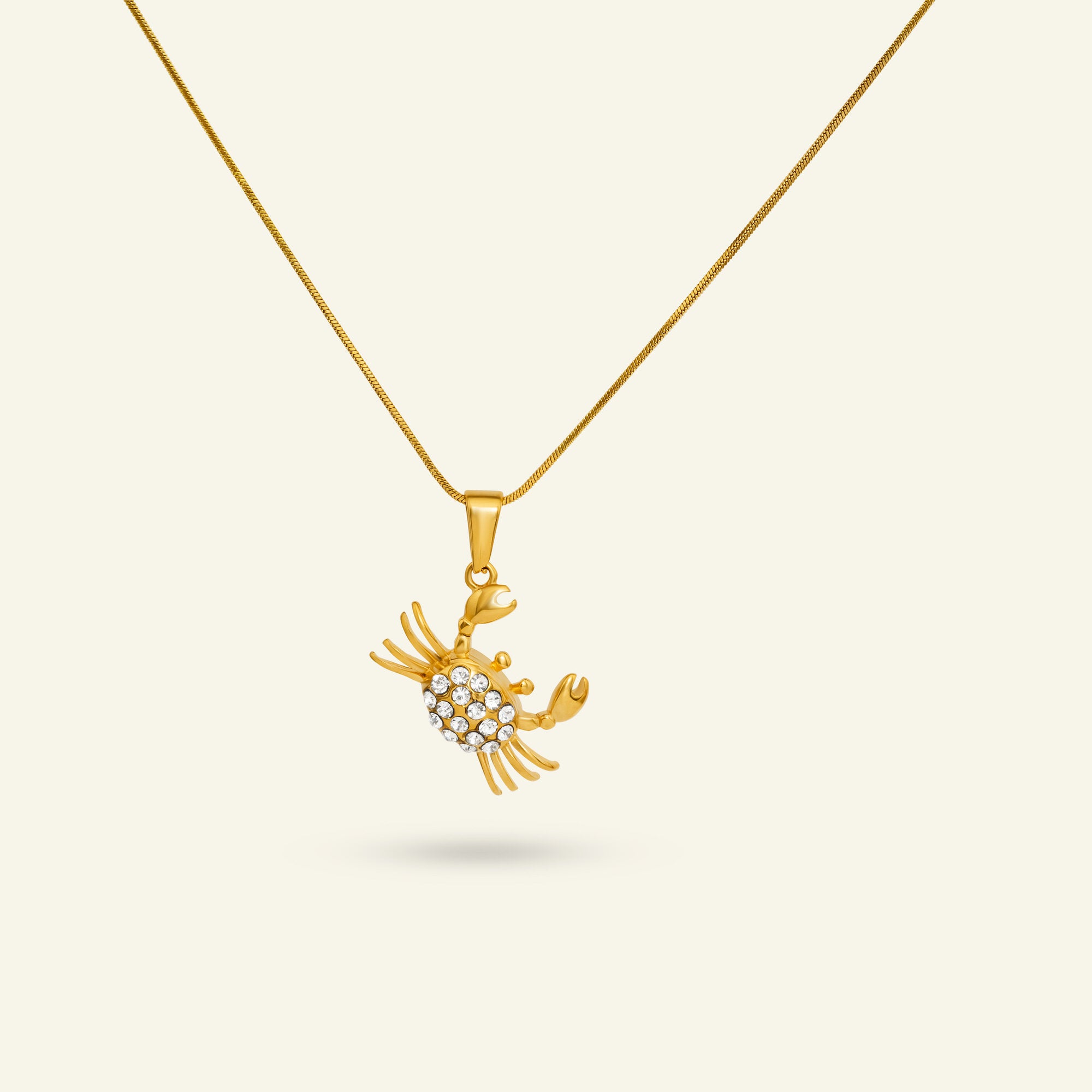 vattentåligt smycke hänge krabba guld